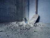 Device dropped in construction dust.