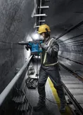 Bosch GBH 6-42 C rotary hammer drill in use.
