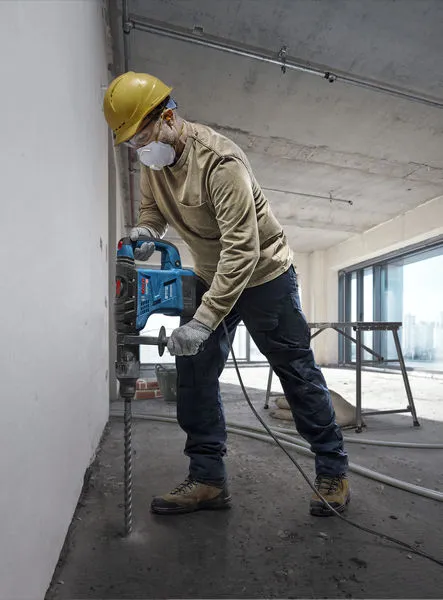 Bosch GBH 6-42 concrete rotary hammer in use.