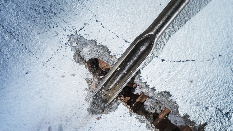 PRO SDS max Hollow Gouging Chisel, 26 x 300 mm Chisel breaking through concrete for demolition work.