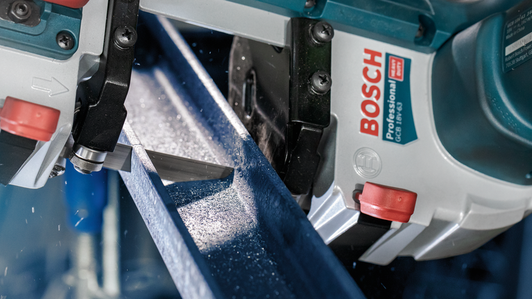 PRO CB2824 Band Saw Blade, 733 mm, 2 pcs Band saw cutting through a metal beam in an industrial setting.
